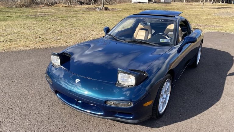 The car of the day at the Bring a Trailer Auction is a 1994 Mazda RX-7