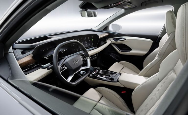 The Audi Q6 e-tron 2025 has a dashboard with many screens and a head-up display that uses virtual reality