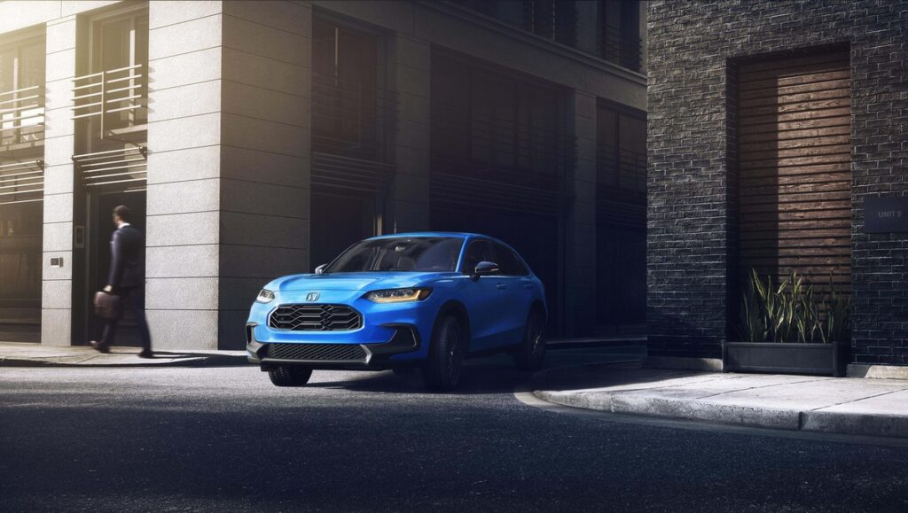 Honda HR-V Review image of a blue 2026 Honda HR-V parked curbside in a city setting