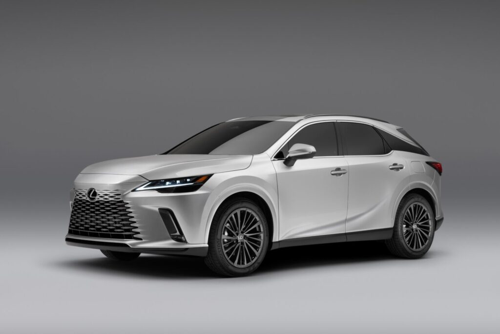 2026 Lexus RX luxury SUV in white shown in studio side profile