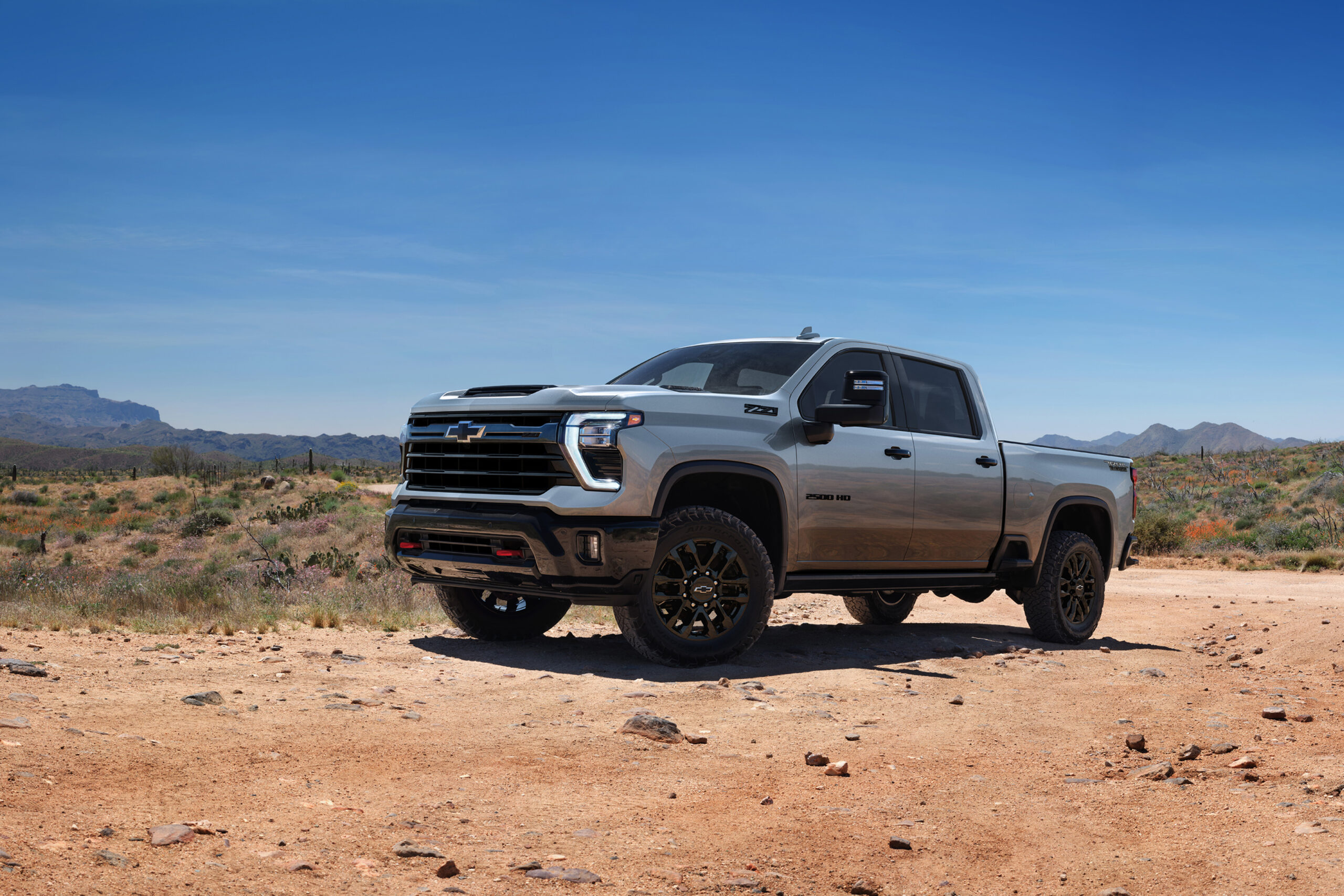 2026 Chevrolet Silverado 2500HD Z71 parked off-road in desert landscape