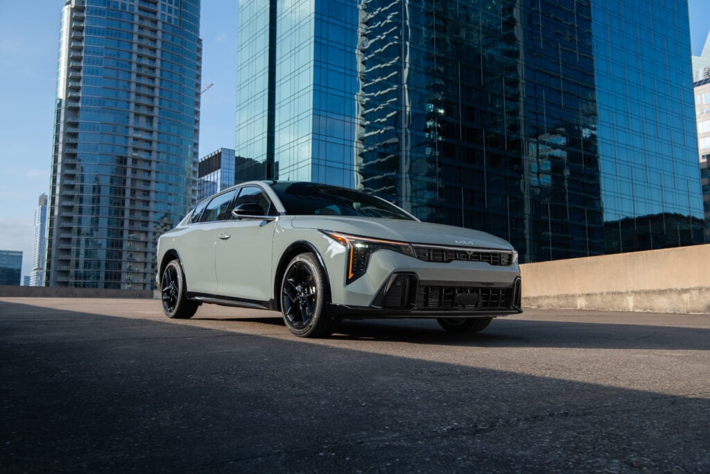 2026 Kia K4 sedan in white shown from a front three-quarter angle