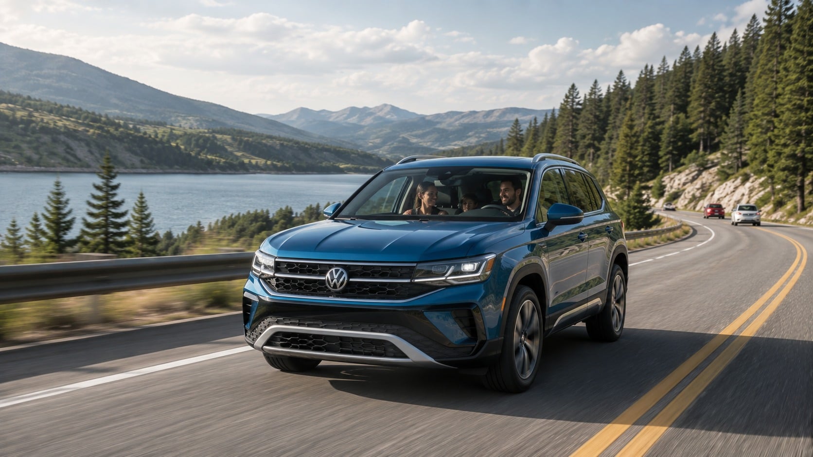 A blue 2026 Volkswagen Taos SUV drives along a mountain lake road with a smiling family visible inside, pine trees and mountains in the background.