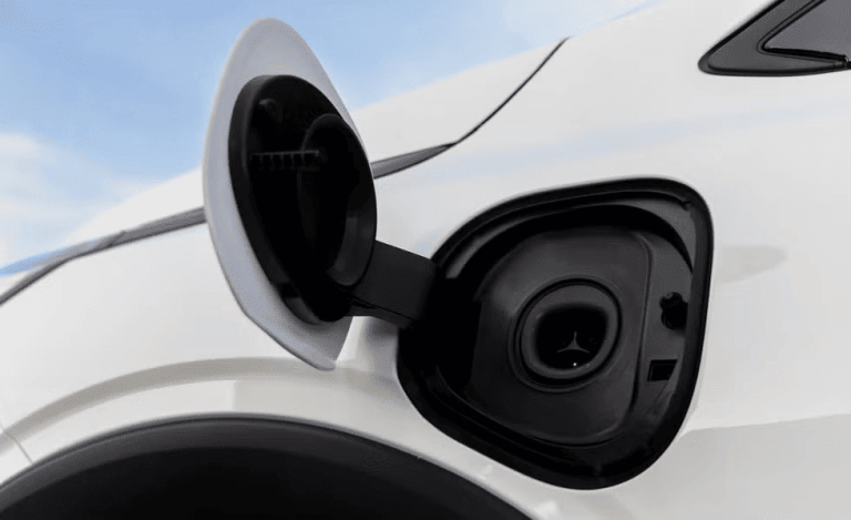 The 2027 Chevy Bolt Teases The Integration Of A NACs Charging Port And Embraces A Bolder, More Angular Design Language