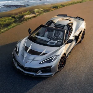 2026 Chevrolet Corvette ZR1X convertible in Quail Silver Limited Edition finish photographed from above on a coastal road at sunset