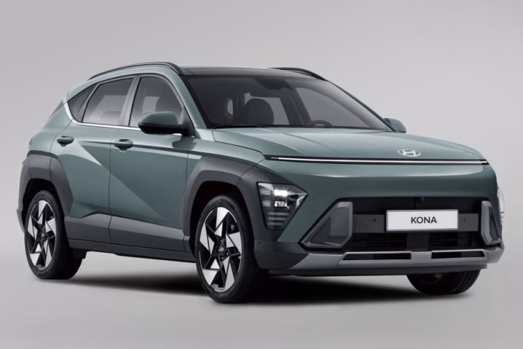 2026 Hyundai Kona Limited AWD subcompact SUV in white driving on a scenic road