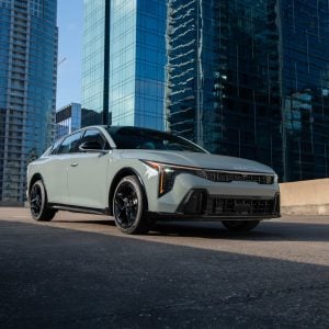 2026 Kia K4 sedan in white shown from a front three-quarter angle