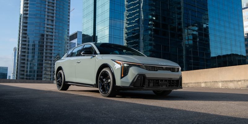 2026 Kia K4 sedan in white shown from a front three-quarter angle